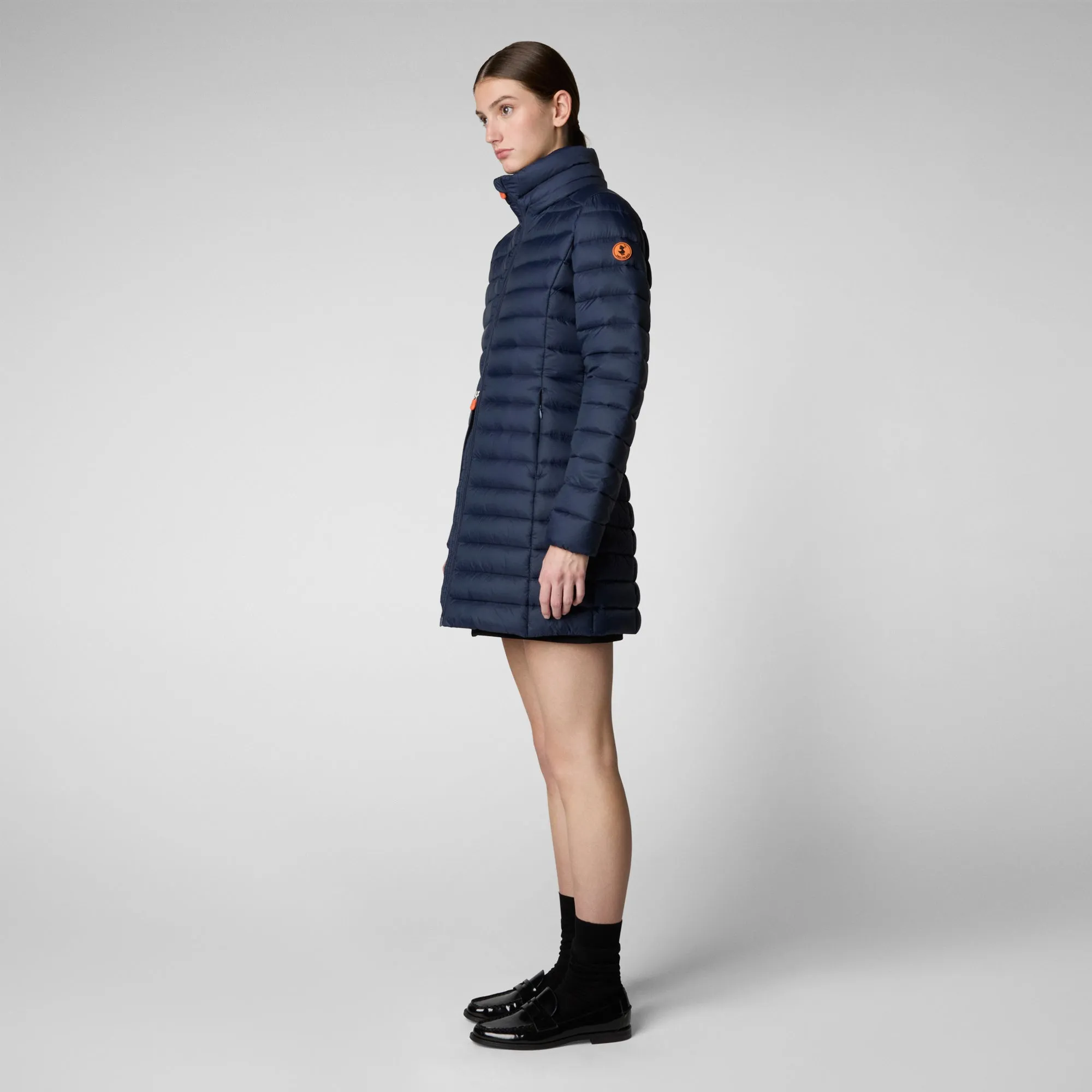 Here is an optimized title for the product:

Navy Blue Womens Hooded Puffer Coat - Animal-Free, Stylish, and Warm

This title includes descriptive and enticing modifiers to attract attention while keeping the relevant product information clear.