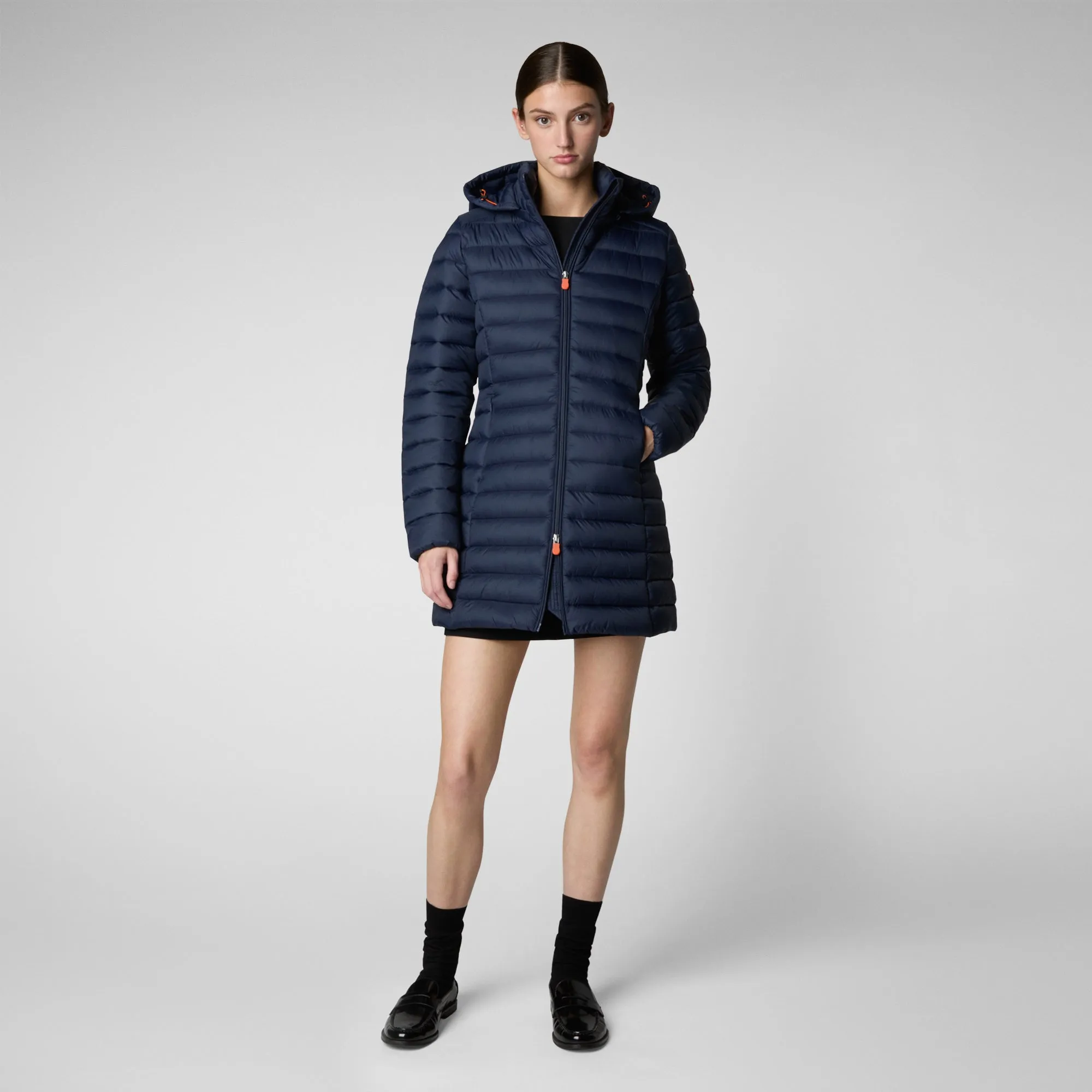 Here is an optimized title for the product:

Navy Blue Womens Hooded Puffer Coat - Animal-Free, Stylish, and Warm

This title includes descriptive and enticing modifiers to attract attention while keeping the relevant product information clear.