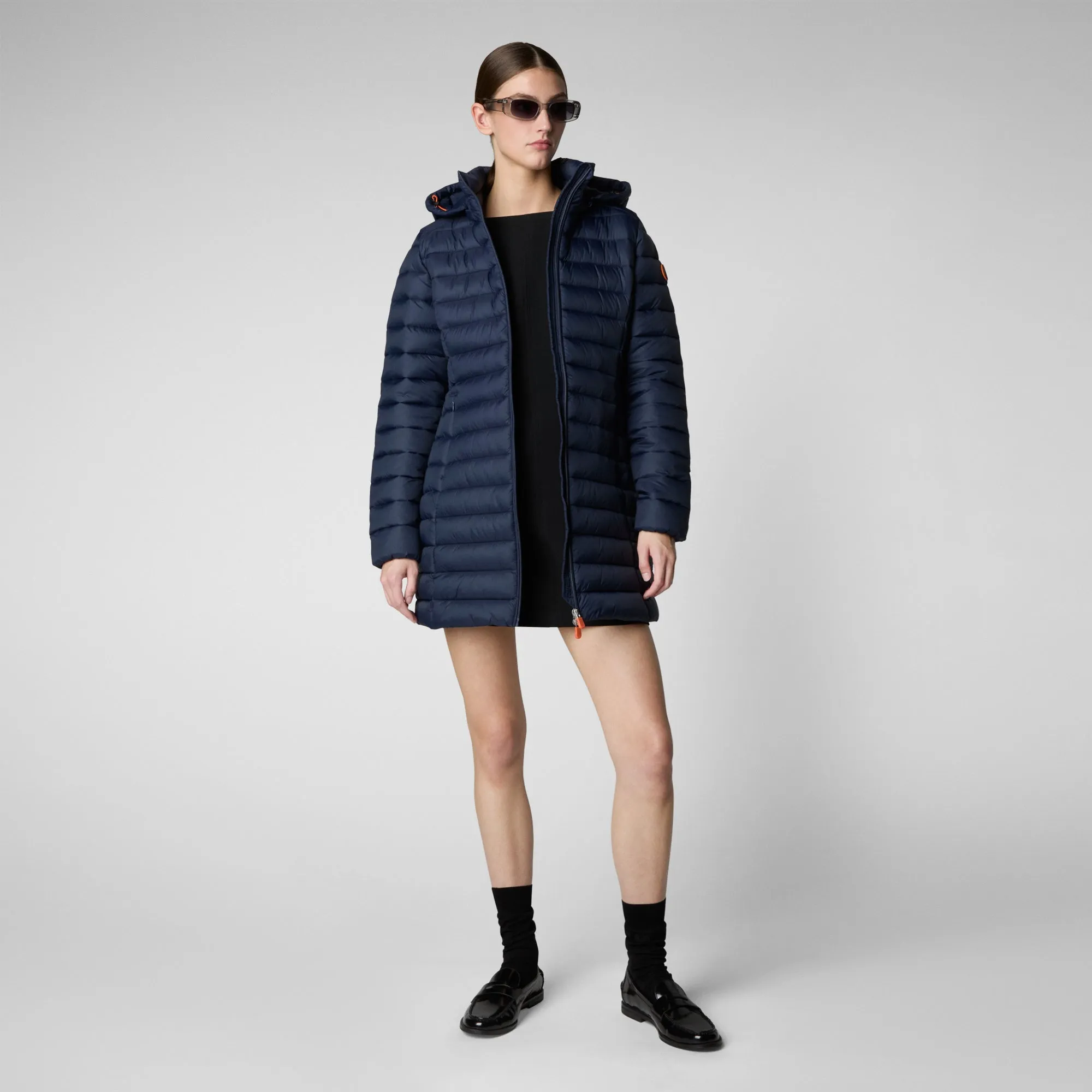 Here is an optimized title for the product:

Navy Blue Womens Hooded Puffer Coat - Animal-Free, Stylish, and Warm

This title includes descriptive and enticing modifiers to attract attention while keeping the relevant product information clear.